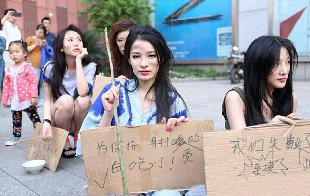 Models Protest At Car Show Ban