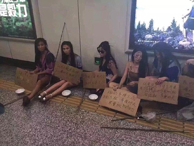 Models Protest At Car Show Ban