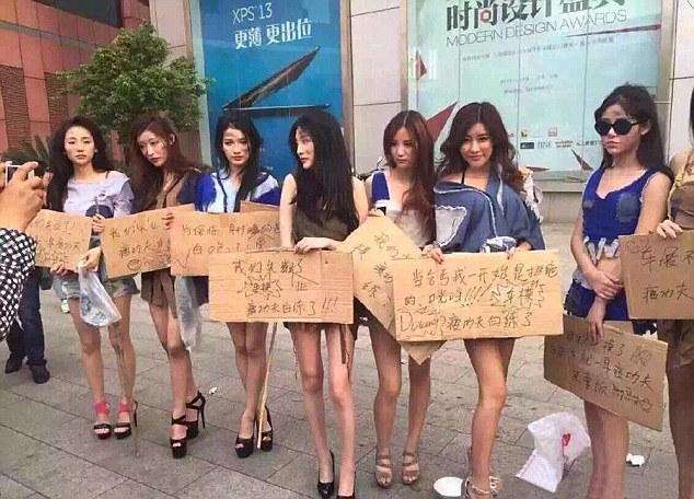 Models Protest At Car Show Ban